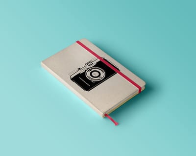 Graphic camera illustration on a notebook